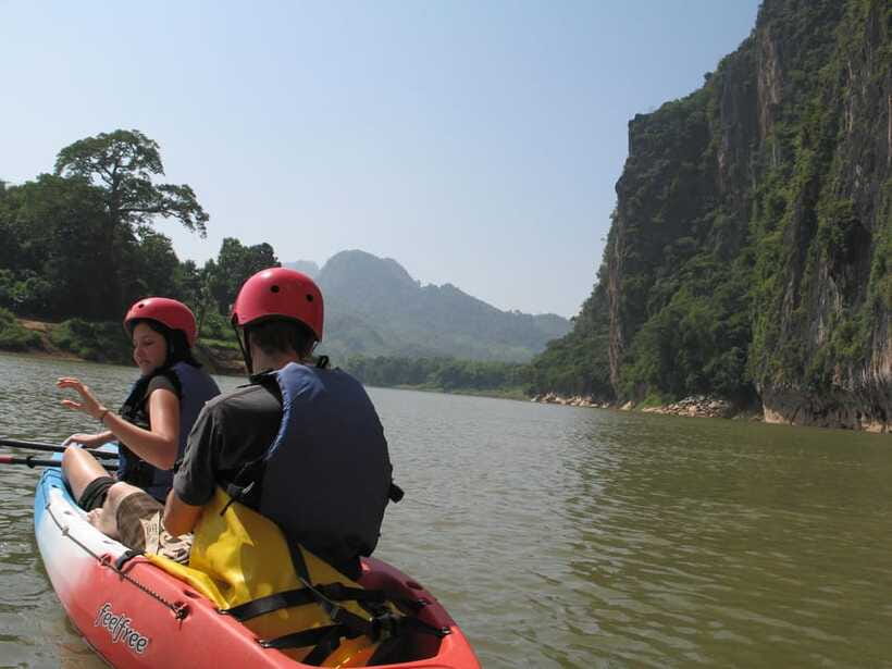 From Luang Prabang: Guided Mountain Bike Tour with Lunch - The river lunch and shower at Manifa Elephant Camp