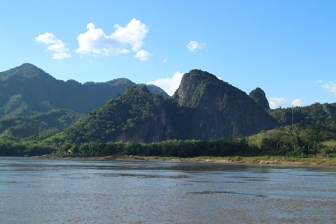 FULL DAY – Kuang Si Waterfall, Kayak on the Nam Ou / Mekong River, Pak Ou Caves - The Mekong section is shorter and more relaxed