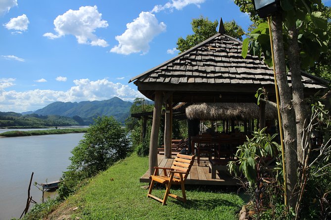 FULL DAY – Kuang Si Waterfall, Kayak on the Nam Ou / Mekong River, Pak Ou Caves - The Nam Ou paddle begins among limestone cliffs
