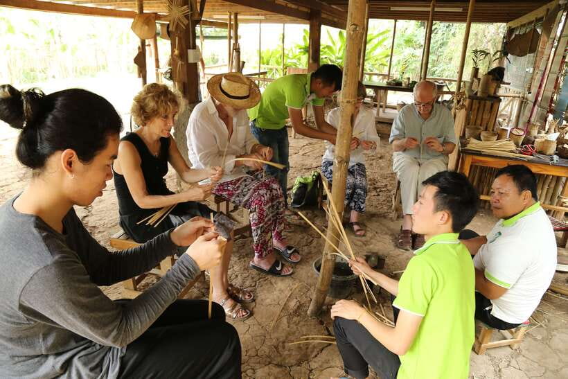 Luang Prabang: Bamboo Weaving Workshop & Cooking Class - Cutting bamboo and weaving a small keepsake