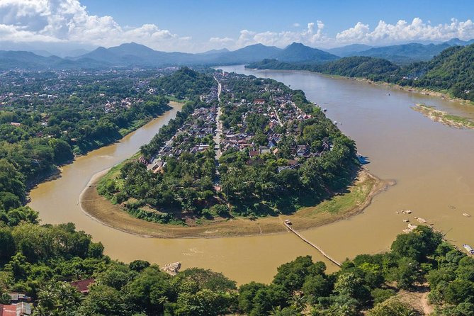 Luang Prabang City Tour & Kuang Si Waterfalls - The 5:30 am alms ceremony and morning market