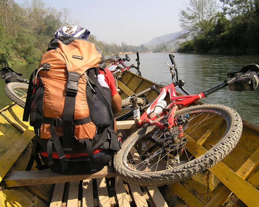 Luang Prabang: Countryside Mountain Bike Tour with Lunch - The busy road before the quiet country lanes