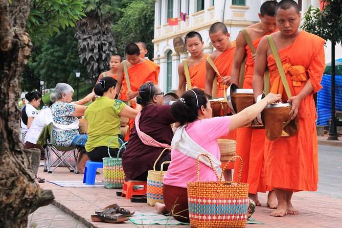 Luang Prabang Early Morning Alms Giving and Wet Market - Practical clothing, transport, and booking advice