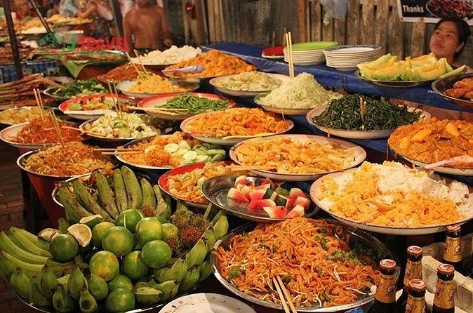 Luang Prabang Evening Food Tour by Tuk-Tuk - Markets, fruit drinks, and Lao specialties