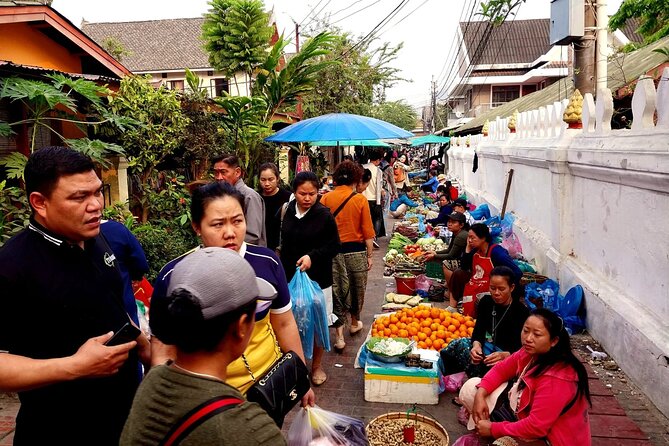 Luang Prabang Foodie Walking Tour and Monk Blessing - Following the food market through Luang Prabang