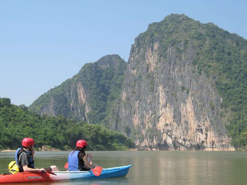 Luang Prabang: Kayak Tour to Pak Ou Caves - Starting on the calm Nam Ou River