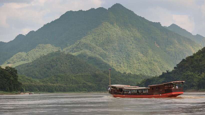 Luang Prabang: Pak Ou Caves & Kuang Si Falls Day Trip - Lunch beside the Mekong