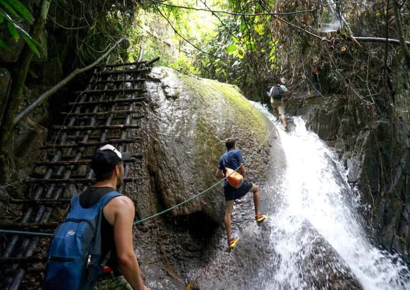 Nong Khiaw: 100 Waterfalls, Nam Ou & Khmu Village Day Tour - Following the trail through rice paddies