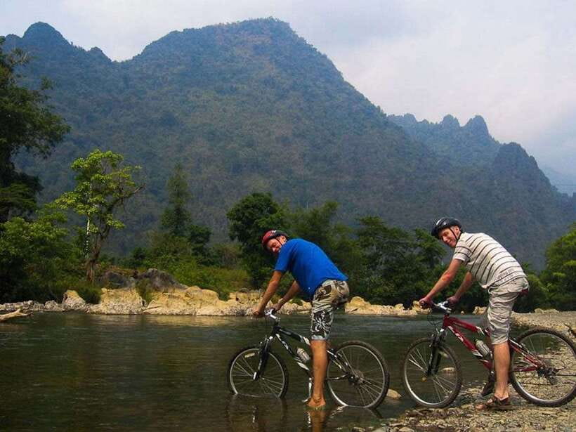 Vang Vieng: Blue Lagoon and Countryside Bike Tour with Lunch - Climbing to Phu Kham Cave
