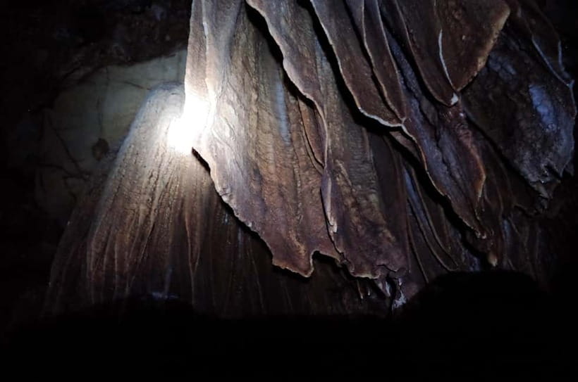 Vang Vieng: Day Tour with Kayaking, Ziplining, and Rafting - Cave tubing at Tham Chang