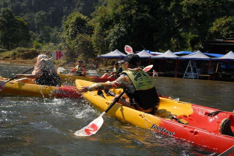 Vang Vieng: Day Tour with Kayaking, Ziplining, and Rafting - A local lunch between the activities