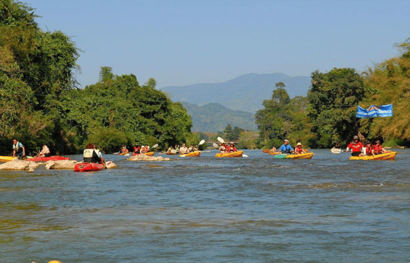 Vang Vieng: Kayaking&Zipline&Water Cave&Tham Chang tour - Ziplining above the forest for 50 minutes