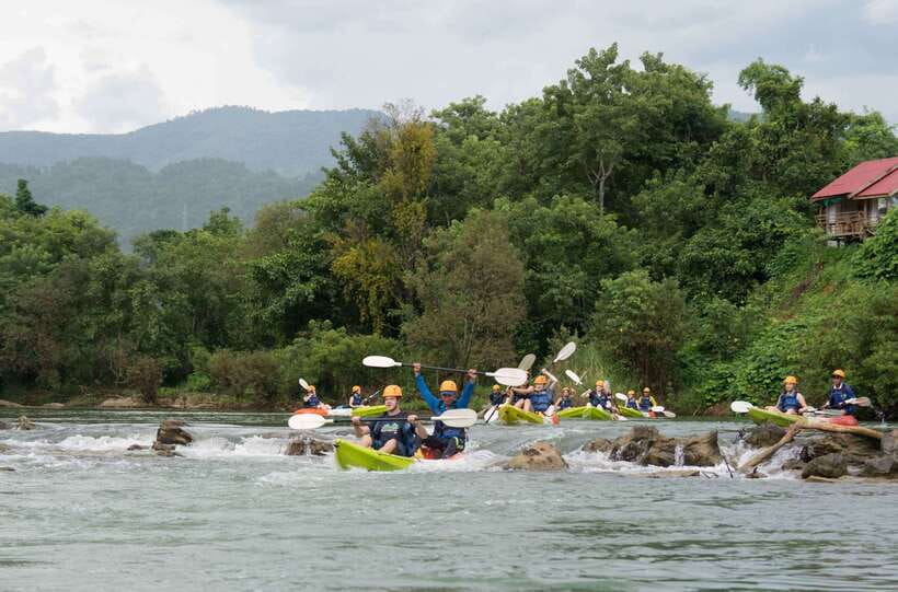 Vang Vieng: Nam Song River Kayak Tour - Paddling through small rapids and mountain views